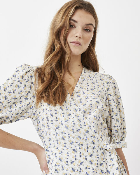 Minsta Lenelia vänd-klär den lilla tungen